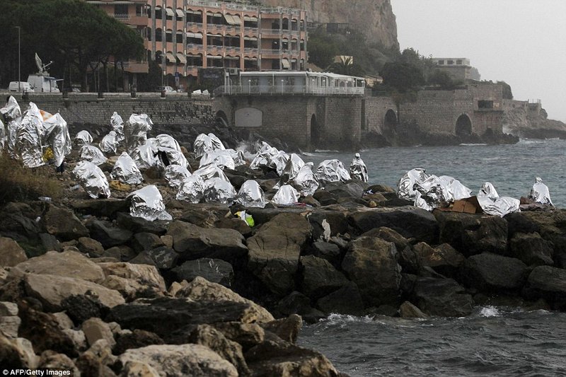 Group of migrants seeking shelter in Ventimiglia (AFP/Getty Images)